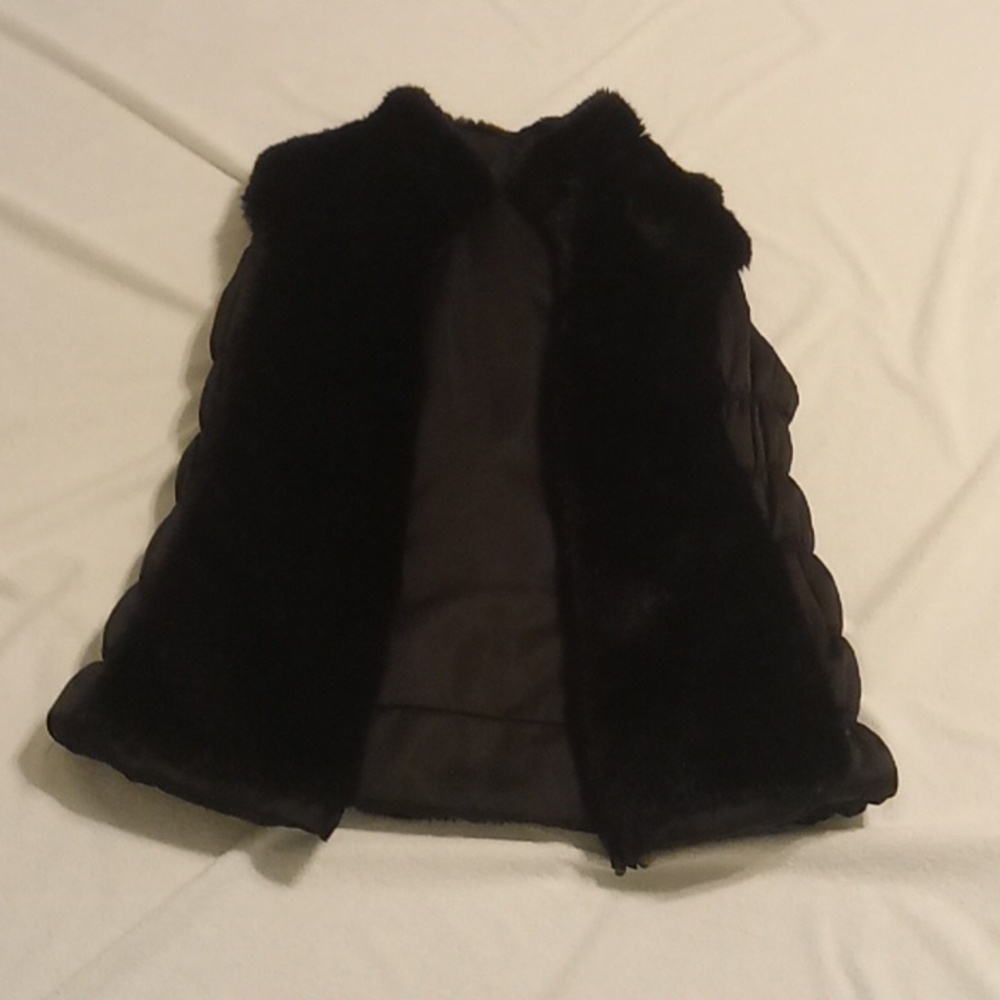 a furry, very warm but women's small, black